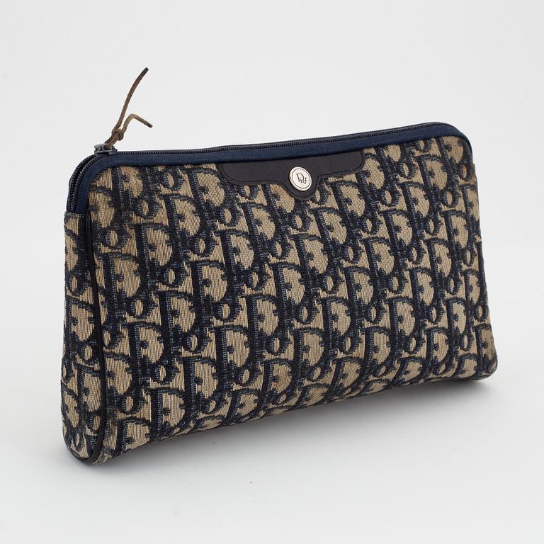 Christian Dior, a canvas handbag, toilet bag and key holder.