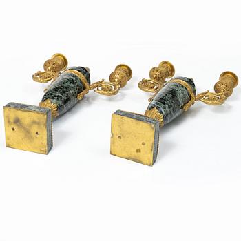 A pair of candelabras, around 1900.
