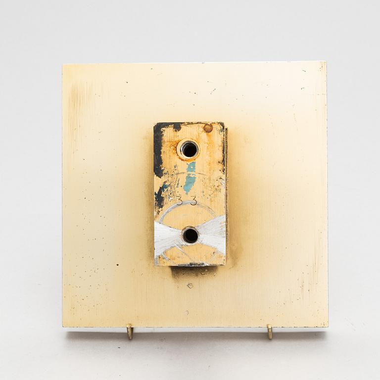 Omega, A door handle from latter half of the 20th century.