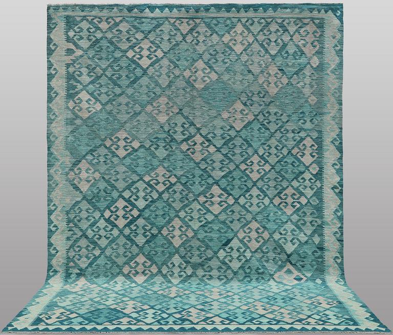 A Kelim carpet, 350 x 245 cm.