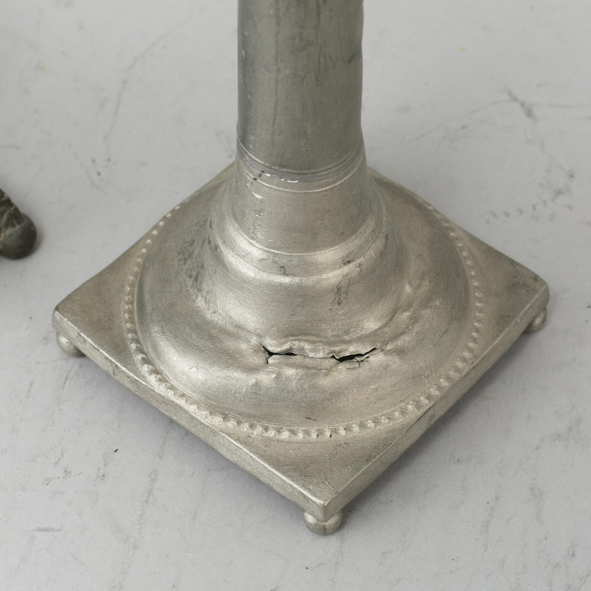 Three 19th century gustavian pewter candlesticks.