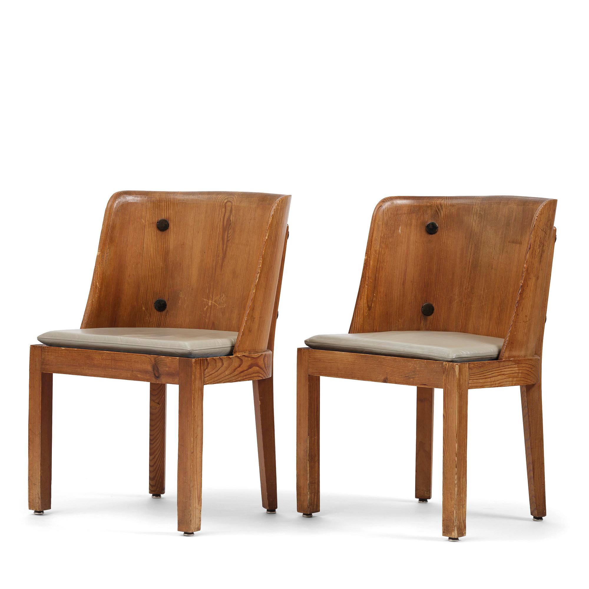 Axel Einar Hjorth, a pair of stained pine "Lovö" armchairs, Nordiska Kompaniet, Sweden, 1930s.