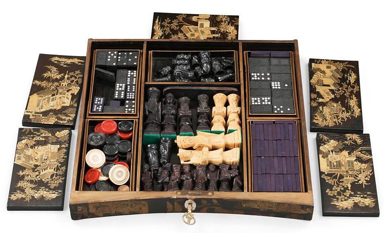 A lacquer games table. Qing dynasty, 19th Century.