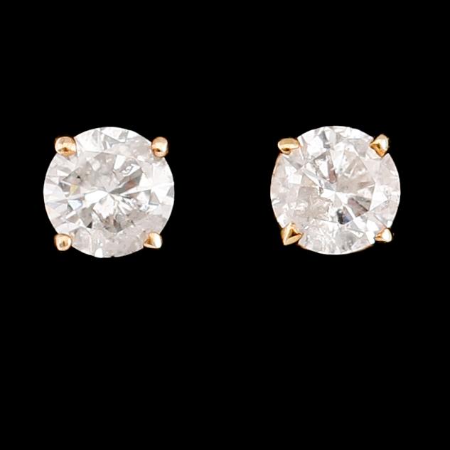 ÖRHÄNGEN, 1 par, 14 k guld, solitära briljantslipade diamanter tot 0.72 ct.