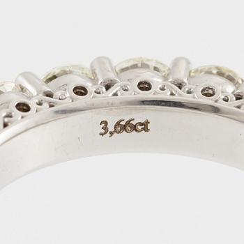 Ring, full eternity, 18K white gold set with brilliant-cut diamonds.