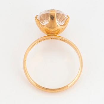 18K gold ring with synthetic white spinel.