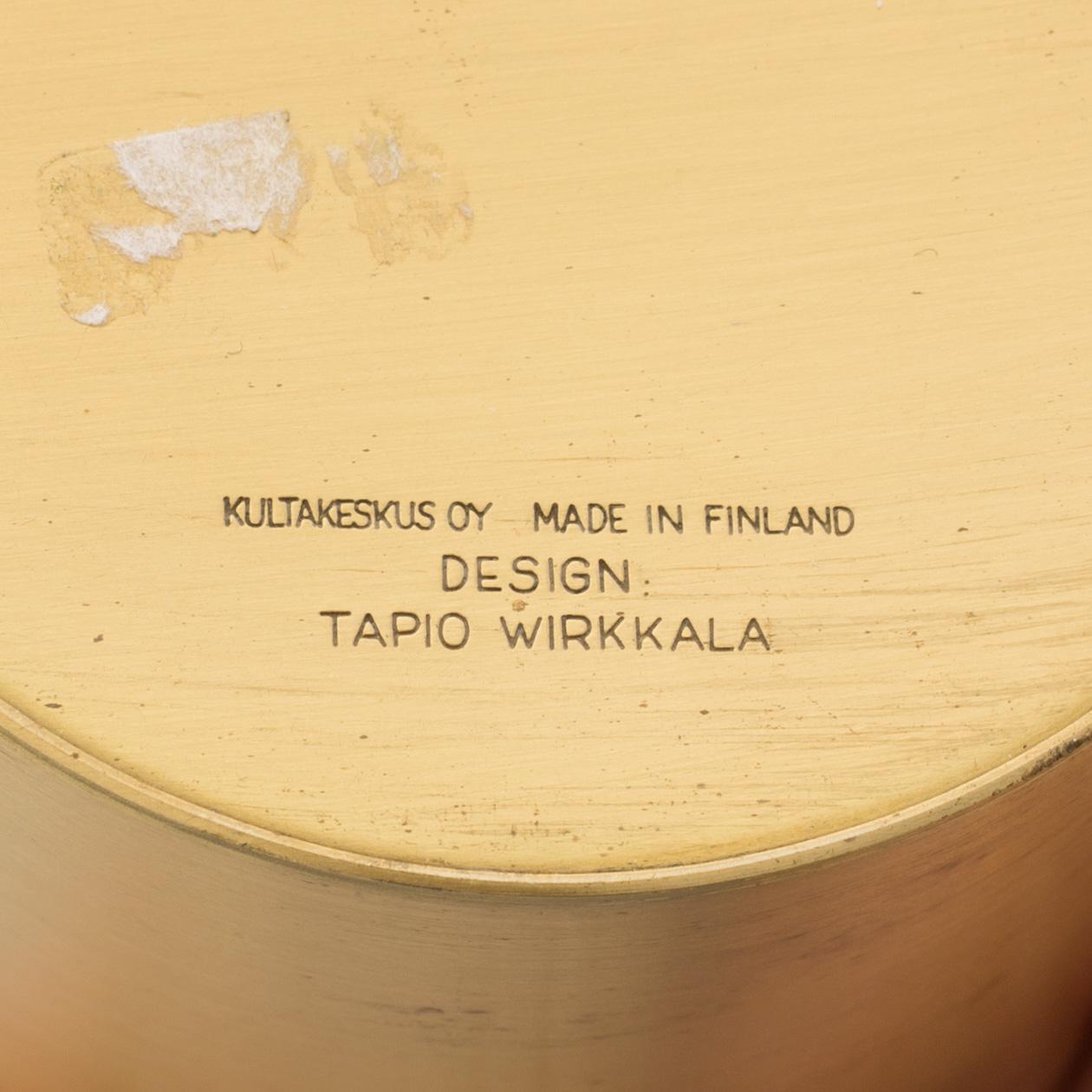 TAPIO WIRKKALA, a pair of brass candlesticks from Kultakeskus Oy, Finland.