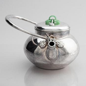 A silver tea pot with cover, Japan, early 20th century.
