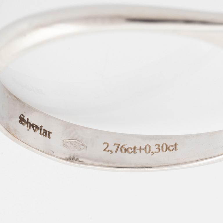 Morganite and brilliant cut diamond ring.