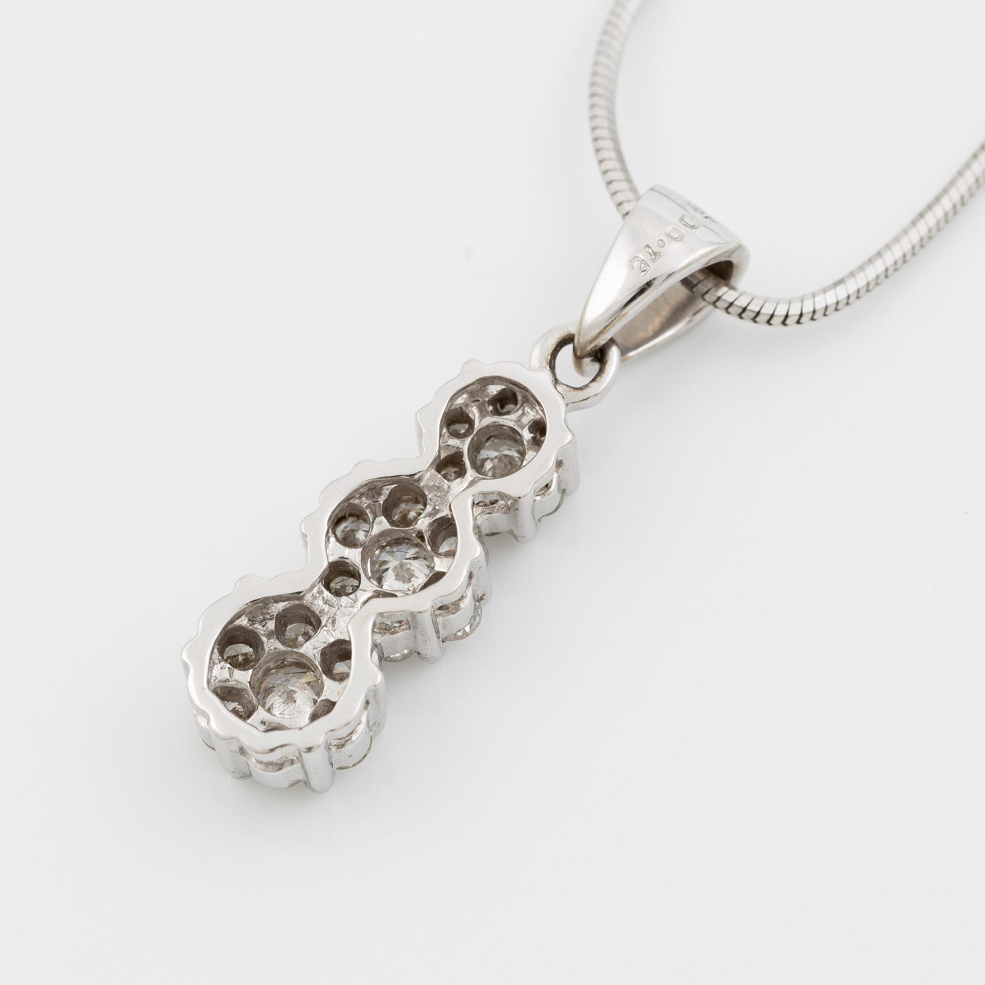 Pendant in 18K white gold set with round brilliant-cut diamonds, with a silver chain.