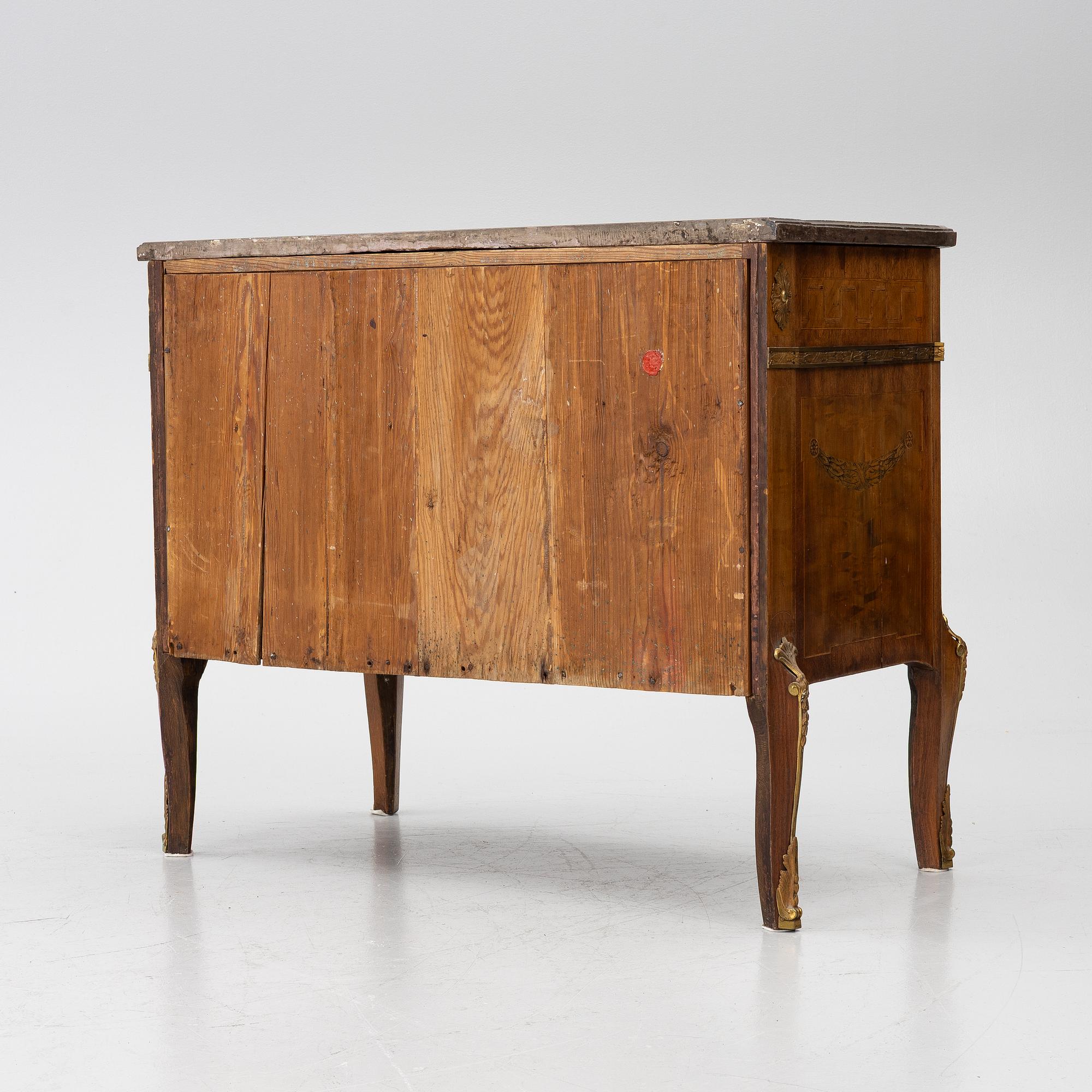 A Gustavian marquetry commode, Stockholm, late 18th century incorporating later elements.