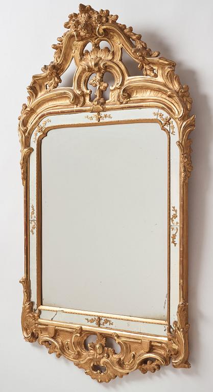 A Swedish Rococo 18th century two-light mirror/girandol mirror.