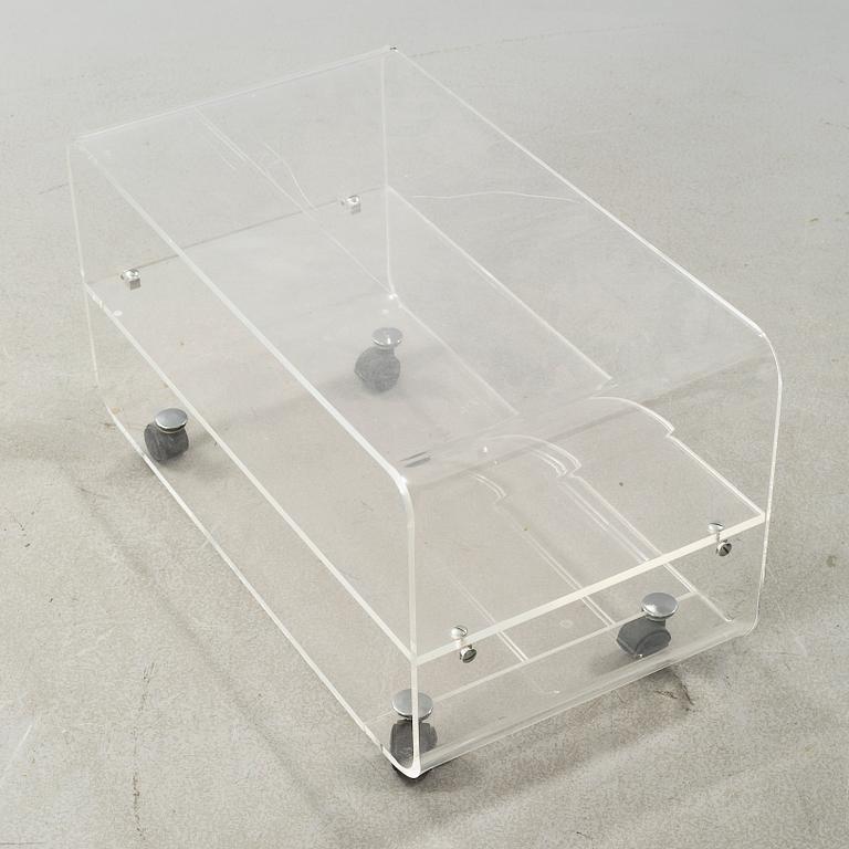 A sofa table from the fourth quarter of the 20th cenutry.