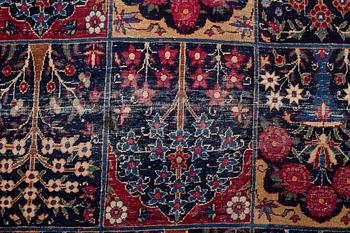 A carpet, an antique/a semi-antique Yezd, ca 557-562 x 366,5-370,5 cm.