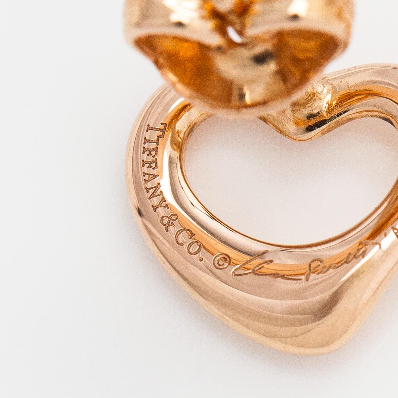 Tiffany & Co, Elsa Peretti, a pair of 18K gold 'Open Heart' earrings.