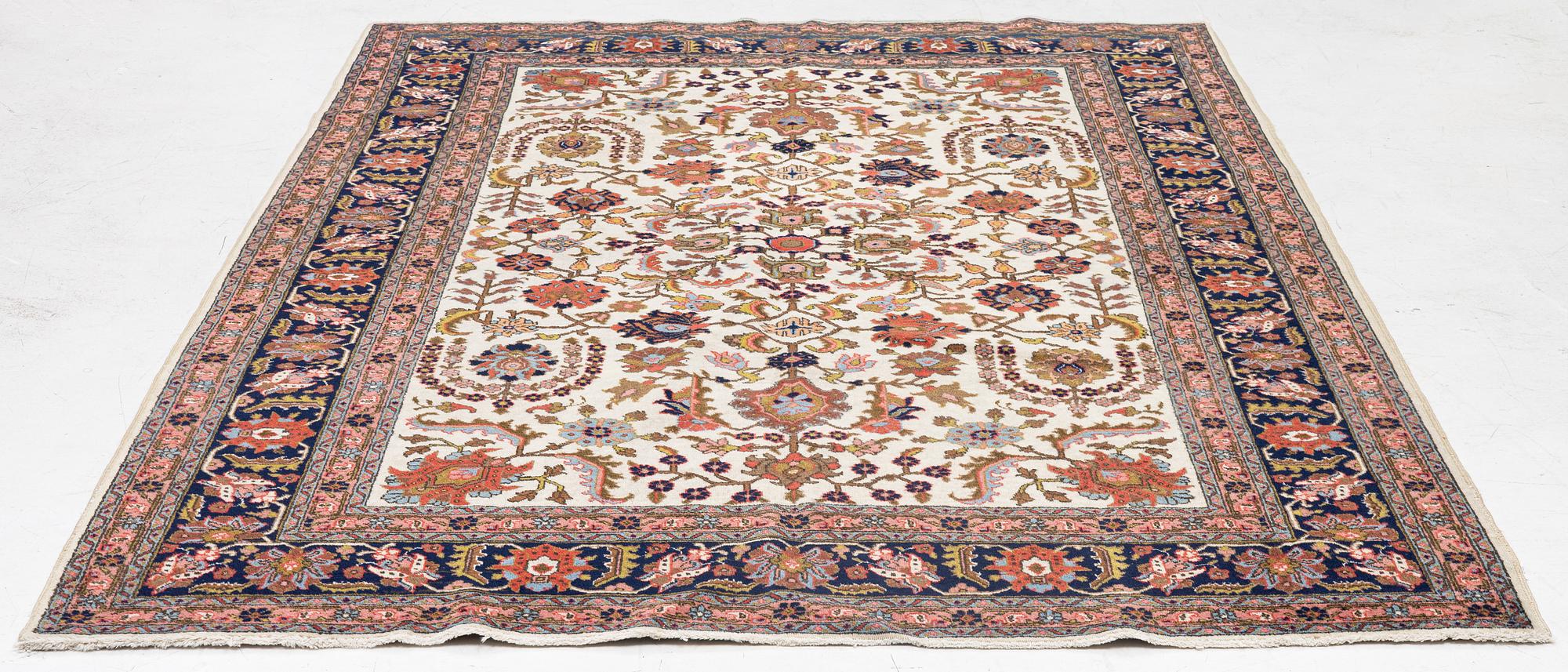 A semi-antique Tabriz carpet, c. 282 x 198 cm.