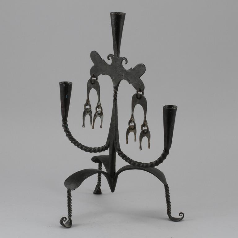 LJUSSTAKE, smide, 1900-tal.