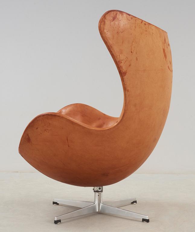 An Arne Jacobsen brown leather 'Egg Chair', Fritz Hansen, Denmark 1963.