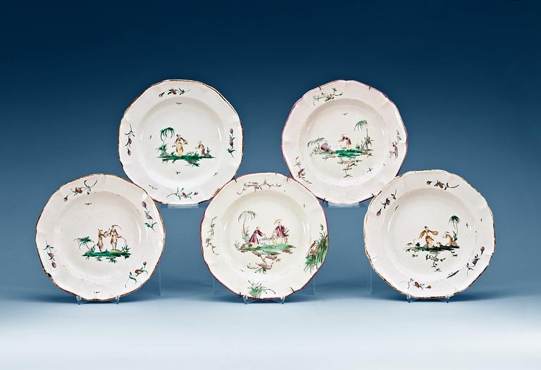 A set of five French faience plates, 18th Century.