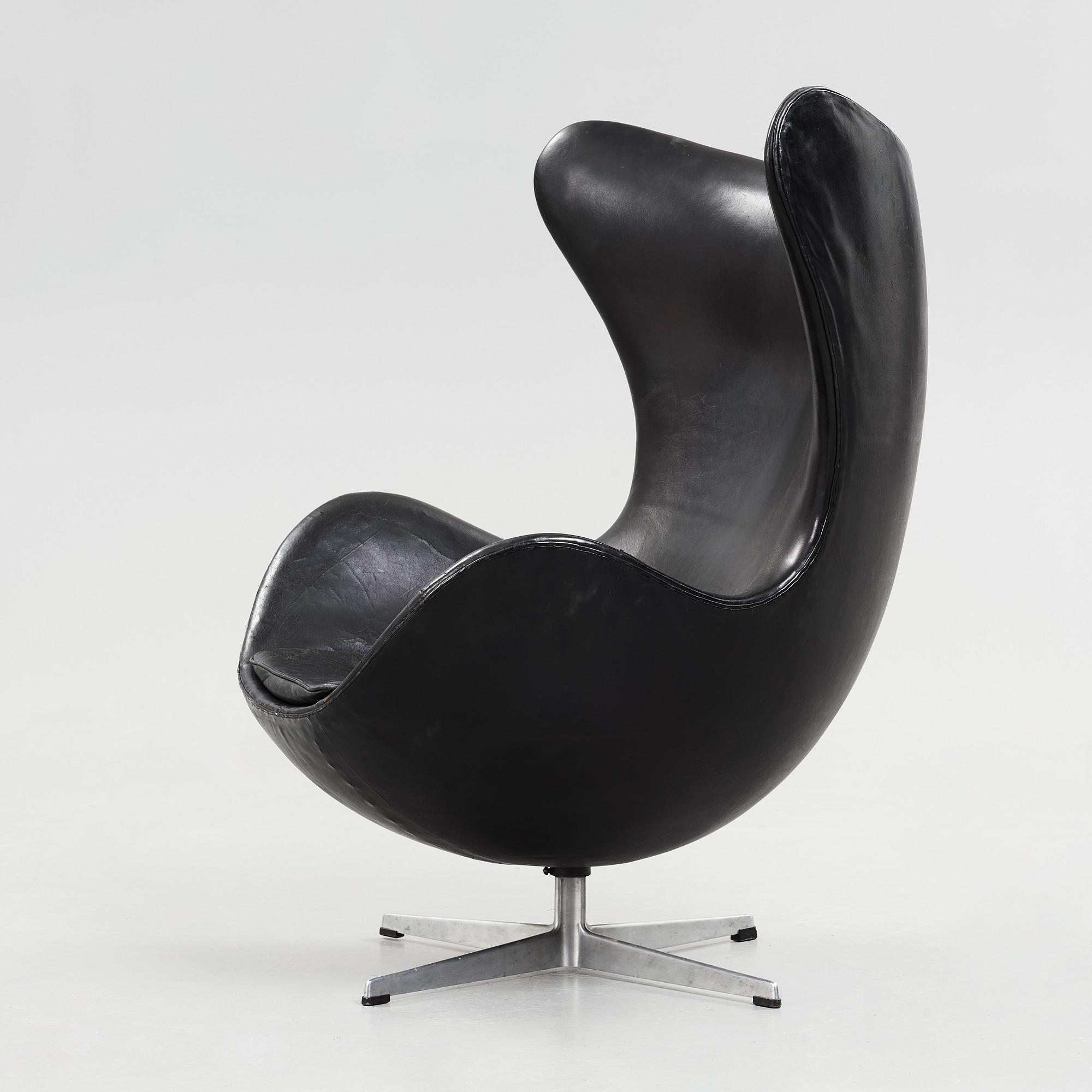 An Arne Jacobsen black leather 'Egg' chair, Fritz Hansen, Denmark 1960's.
