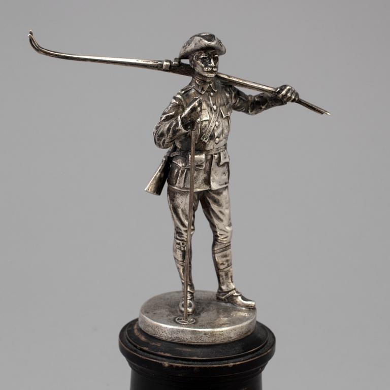 A Swedish silver figurine from CG Hallberg in Stockholm with unclear hallmarks.
