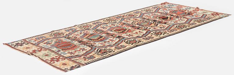 An antique central Anatolian kilim, possibly Konya, c. 339 x 140 cm.