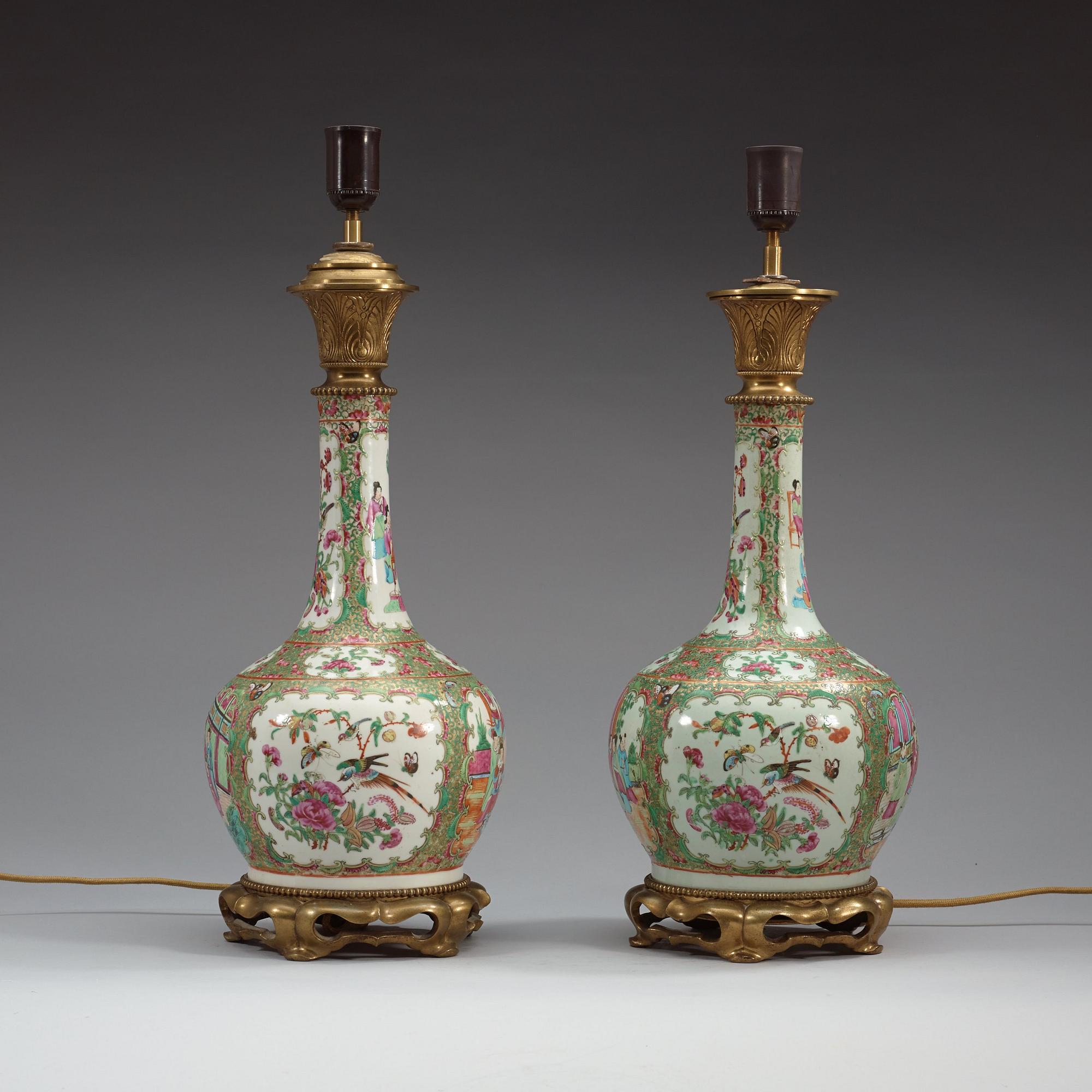 A pair of Canton famille rose lamps / vases, Qing dynasty, 19th century.
