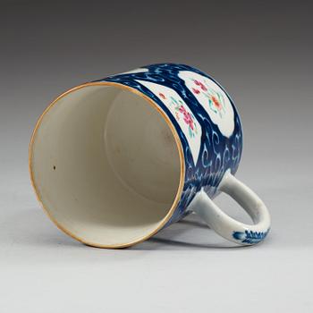 A blue and white and famille rose jug, Qing dynasty (1736-95).