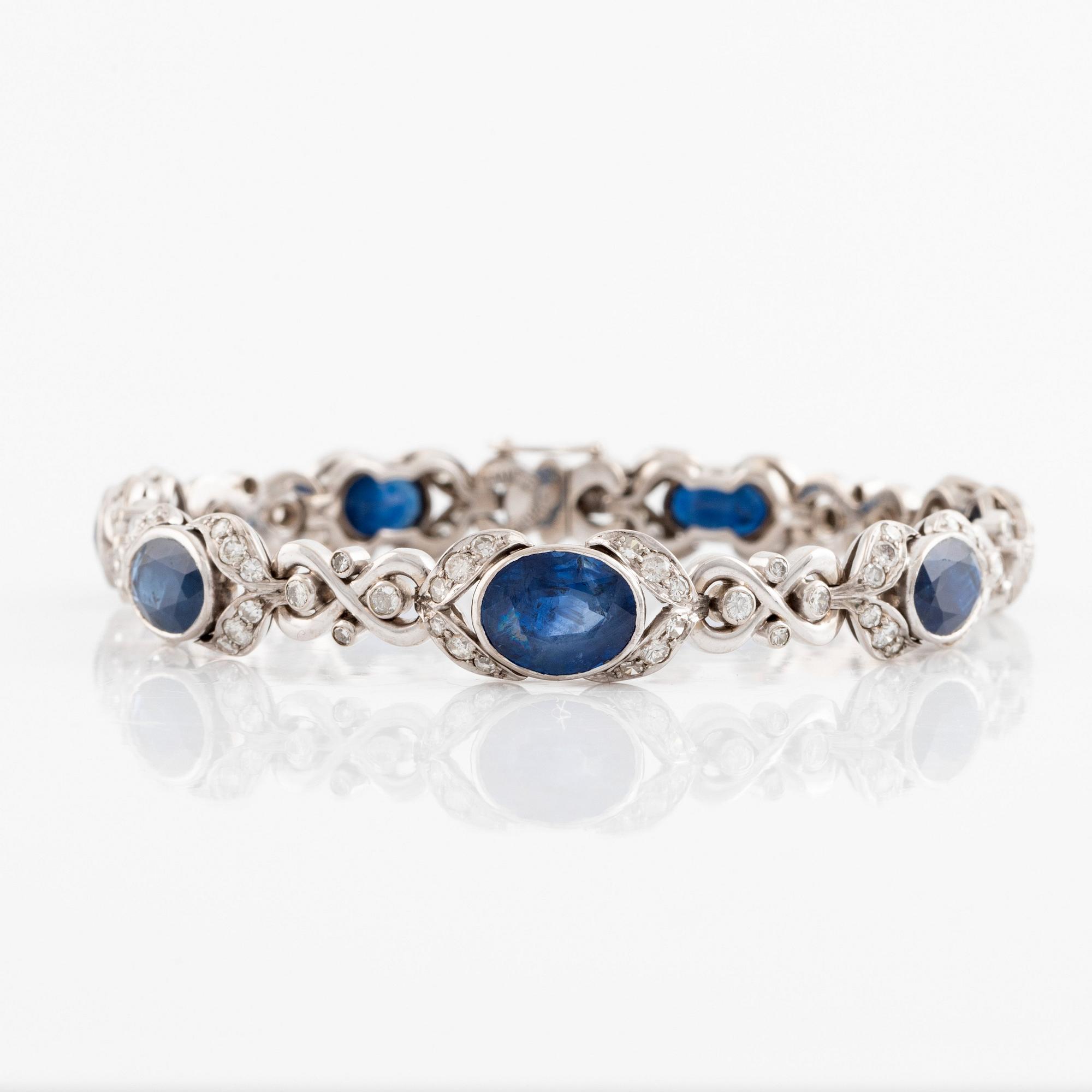 Sapphire and round brilliant cut diamond bracelet, ring and earrings.