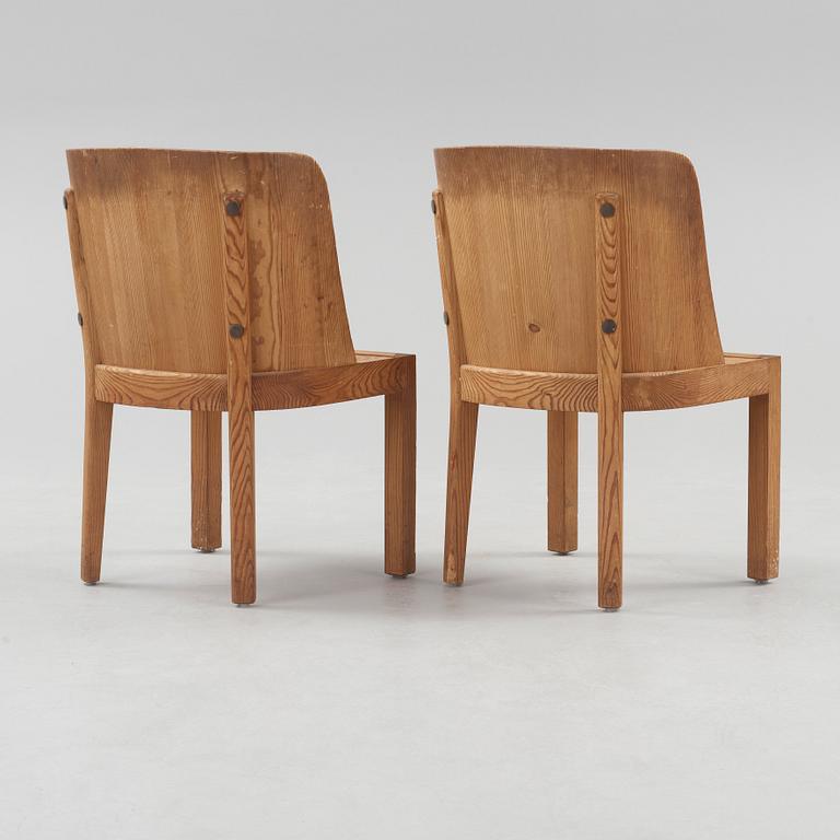 A pair of Axel Einar Hjorth 'Lovö' stained pine armchairs, Nordiska Kompaniet, Sweden 1930's.