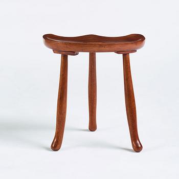 Josef Frank, a three legged mahogany stool, model 336, Svenskt Tenn, Sweden 1940-1950s.