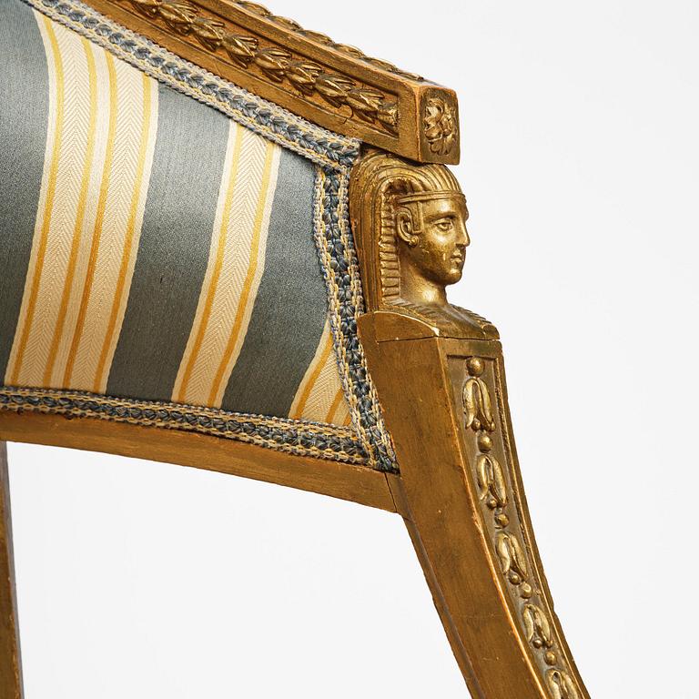 A pair of late Gustavian open armchairs attributed to E. Ståhl (master in Stockholm 1794-1820).