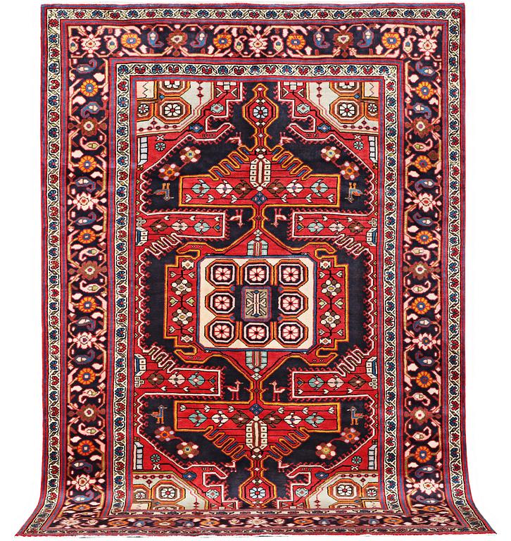 A carpet, Bakhtiari, c. 306 x 215 cm.