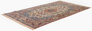 An antique/semi-antique Isfahan, rug c. 239 x 143 cm.