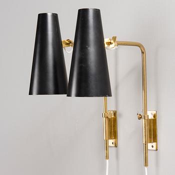 PAAVO TYNELL, A PAIR OF WALL LIGHTS. Manufacturer's stamp Taito. 1950s.