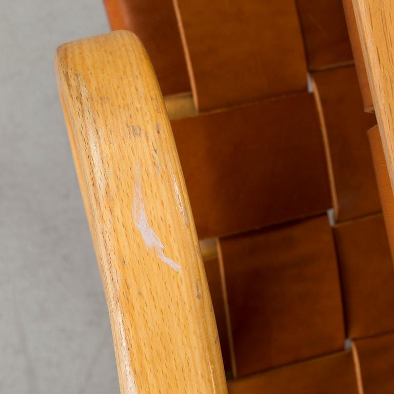 An easy chair with stool by Bruno Mathson.