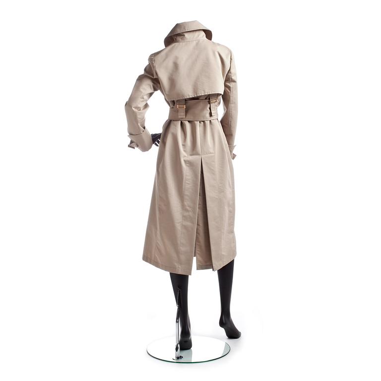 GUCCI, a beige cotton blend trenchcoat.