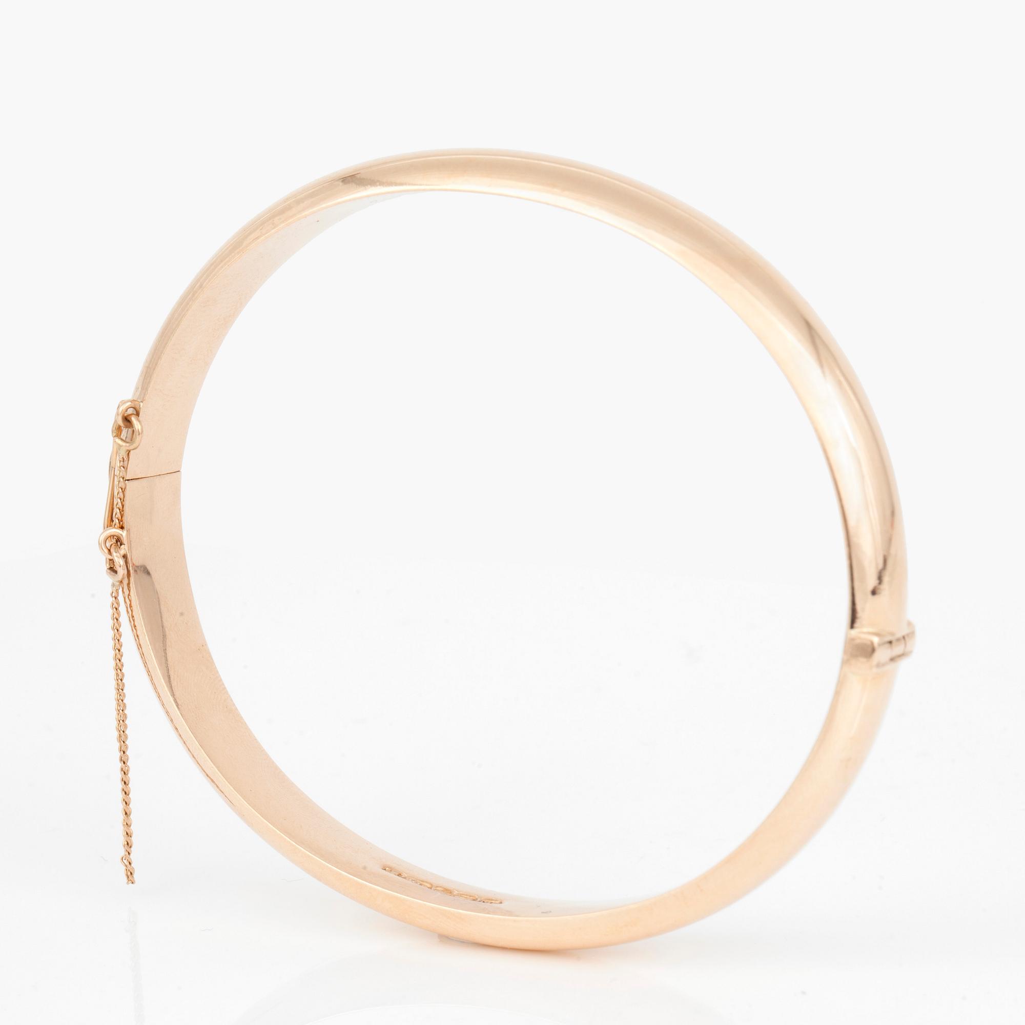 ARMRING, 14K guld.  Finland 1965. Total vikt 14,2 g.