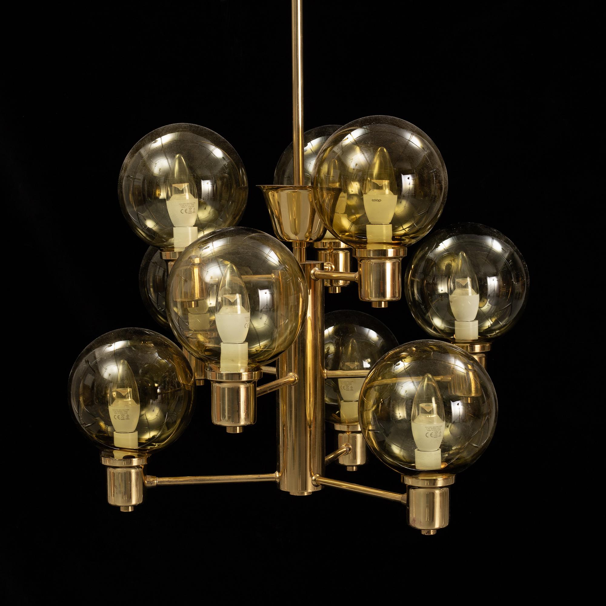 A 1960's brass and glass ceiling light.
