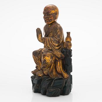 A Chinese statue, early 20th century.