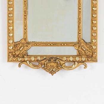 A Baroque style mirror, early 20th Century.