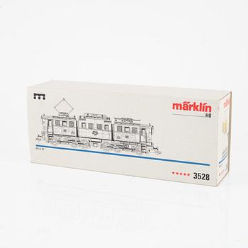 Märklin, two electric locomotives, model 3528 and 3338, and six cargo cars, gauge H0.