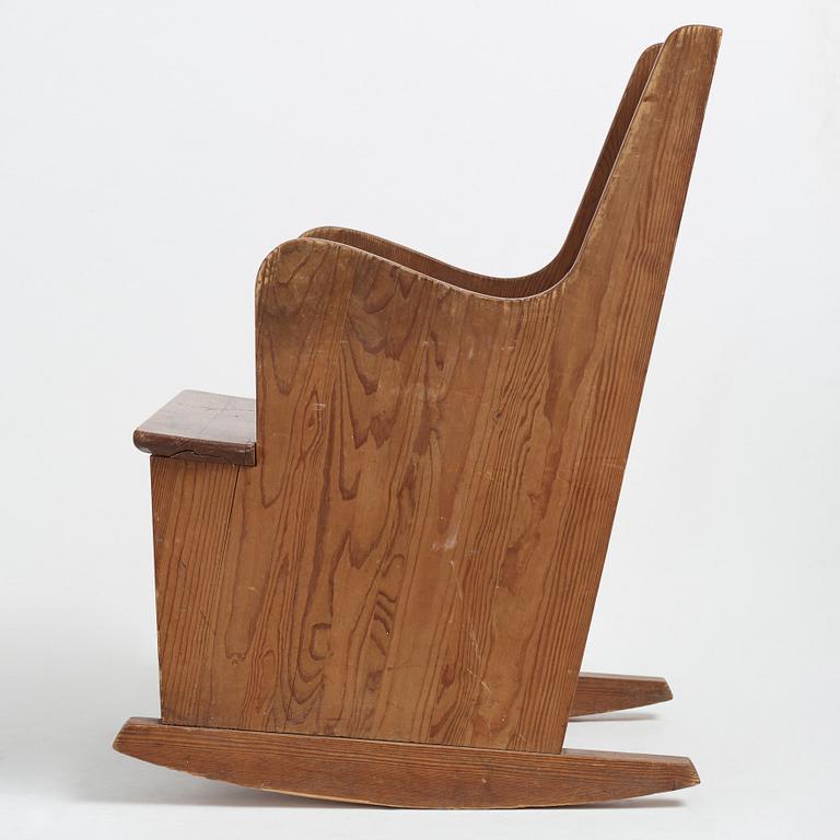 Axel Einar Hjorth, a stained pine "Lovö" rocking chair, Nordiska Kompaniet, 1930's.