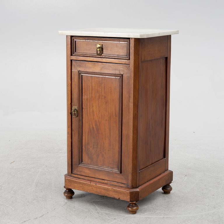 A bedside table, circa 1900.