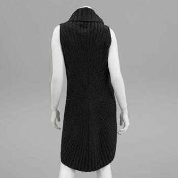 A cashmere/wool knitten sweater/poncho by ralph lauren.