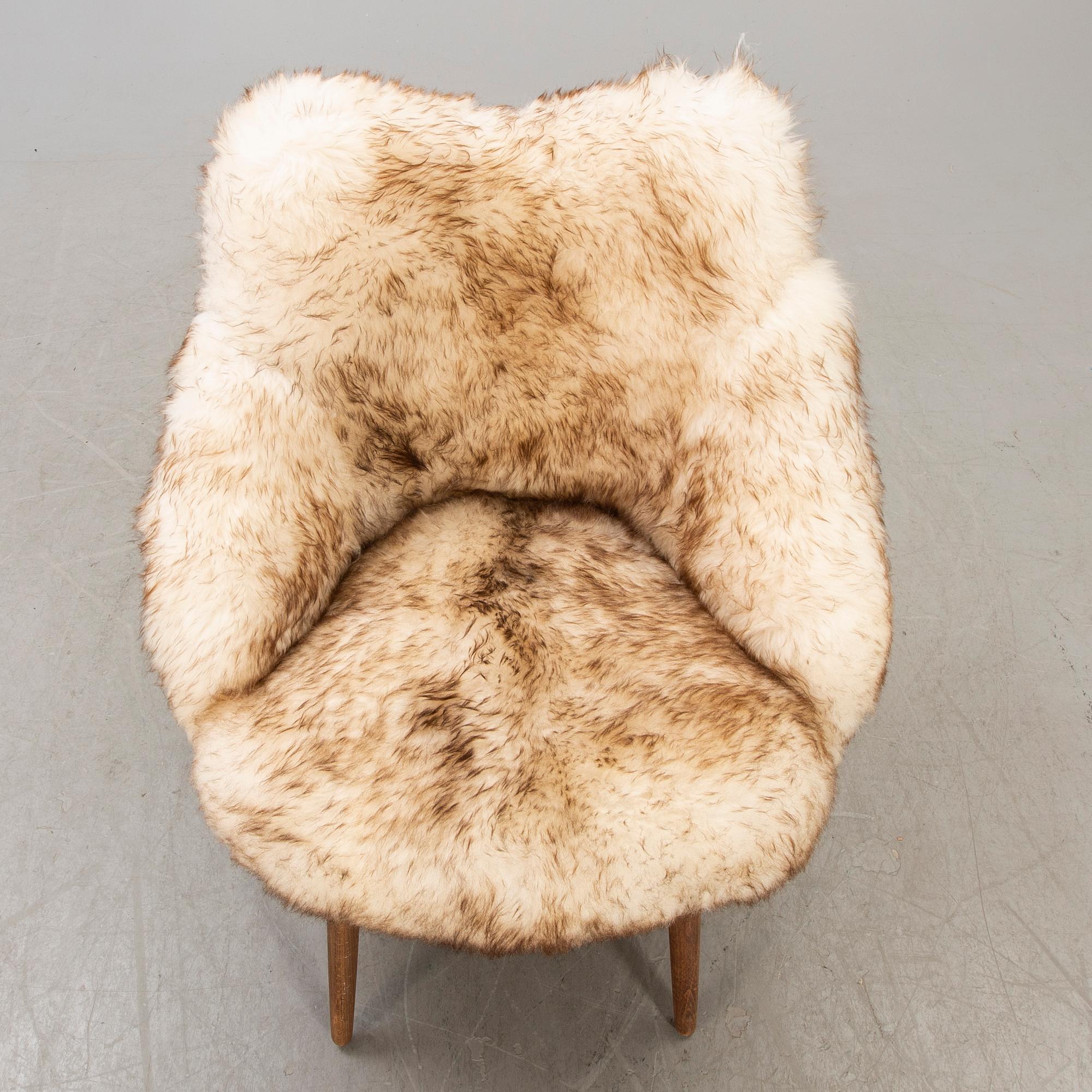 A 1950/60 sheepskin armchair.