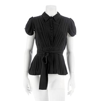 529. PRADA, a black chiffon pleated blouse. Size 46.