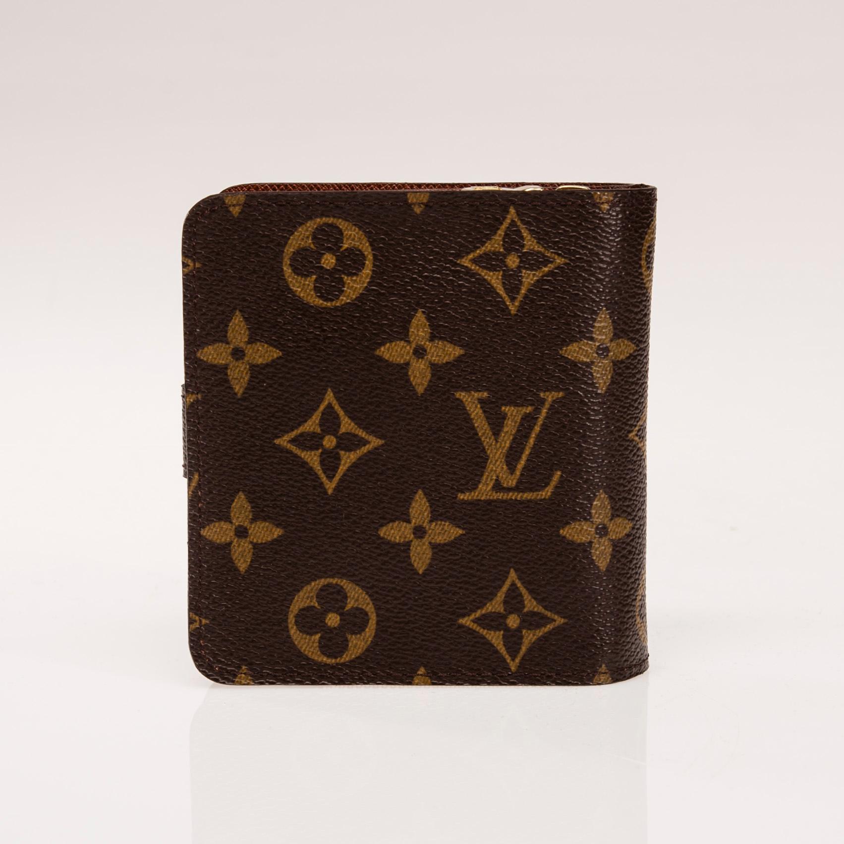 PLÅNBOK, "Compact Zippy", Louis Vuitton.