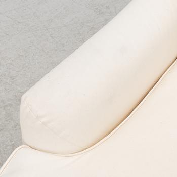 Vico Magistretti, a pair of 'Raffles' armchairs, De Padova, Italy, 21st century.