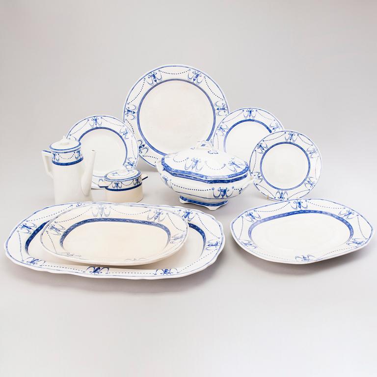 An English late 19th Century 70-piece 'Deva' dinnerware set from Minton, Stoke-on-Trent.